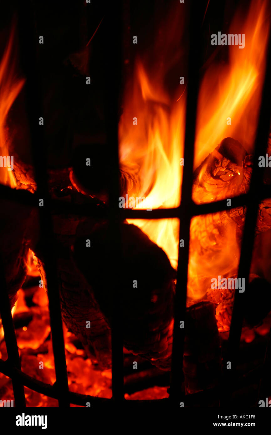 Close up of logs burning in brazier Stock Photo