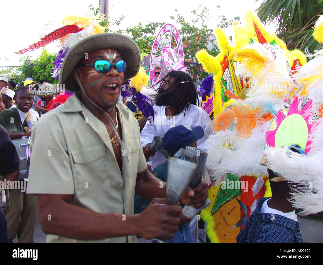 Local men dance and make music in the traditional New Year Junkanoo parade Green Turtle Cay Abacos Bahamas Stock Photo