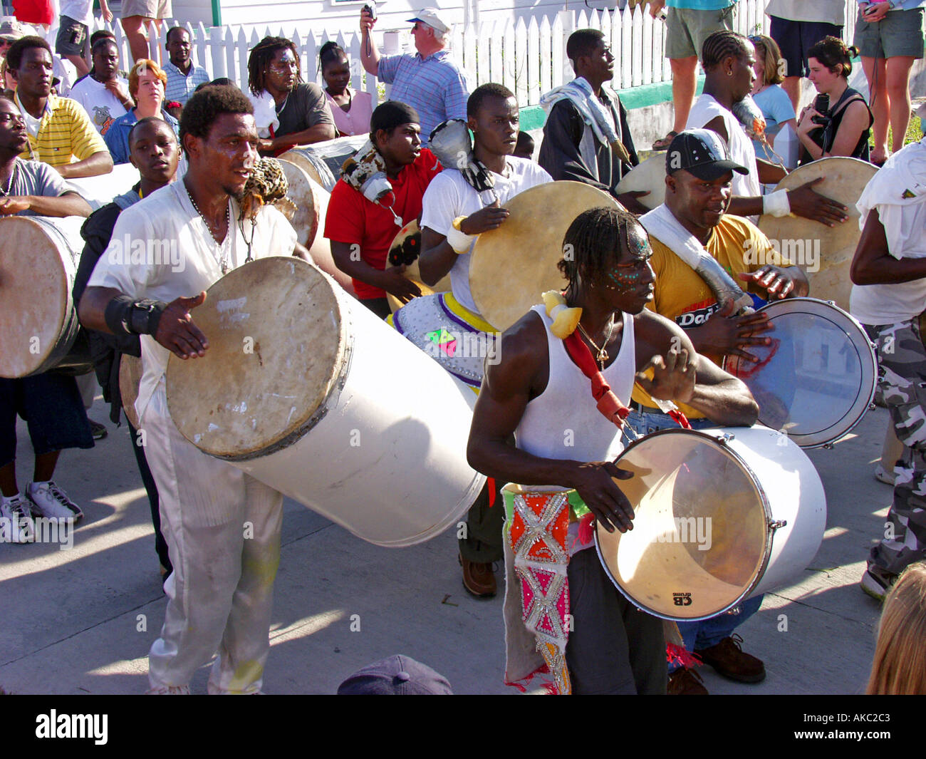 Young men drum as part of the traditional New Year Junkanoo parade in Green Turtle Cay Abacos Bahamas Stock Photo