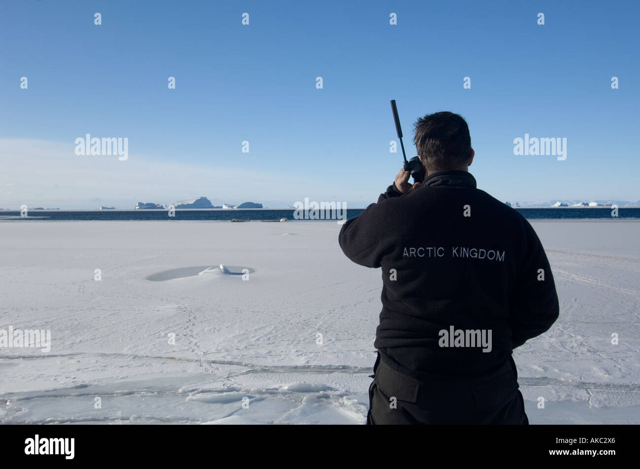 Qaanaaq Greenland Qaanaaq Greenland Using iridium satellite phone in the high Arctic Stock Photo