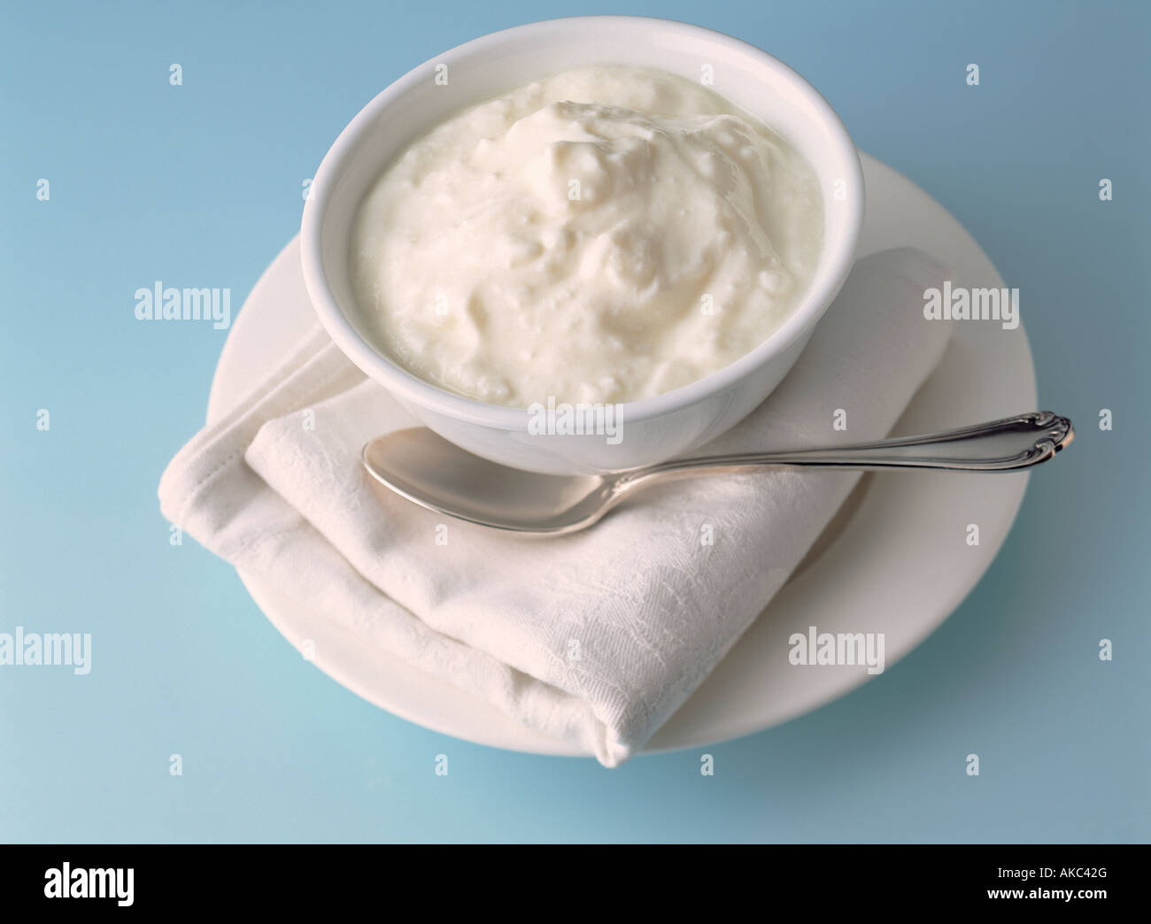 Individual portion plain natural yogurt hires stock photography and