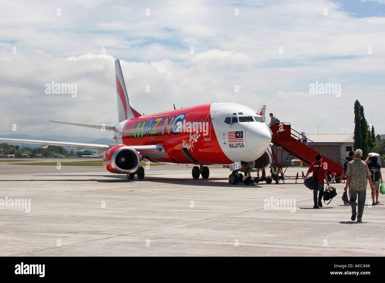 Air Asia flight on the runway at Kota Kinabalu International Airport KKIA Stock Photo