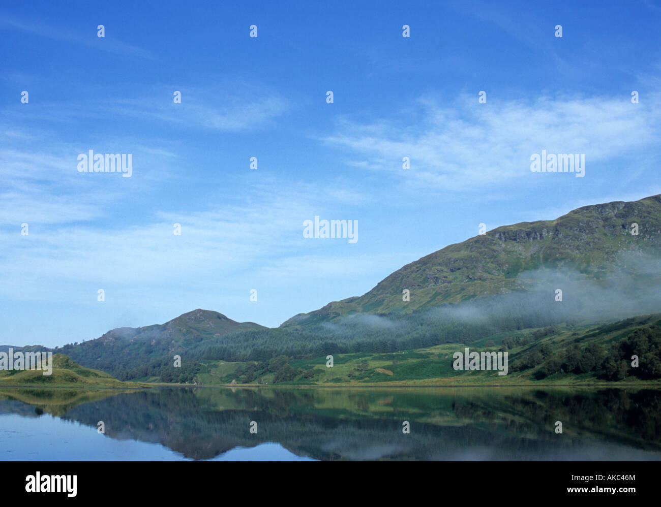 A Hill Reflected In A Lake In Perthshire,Scotland,Uk Stock Photo
