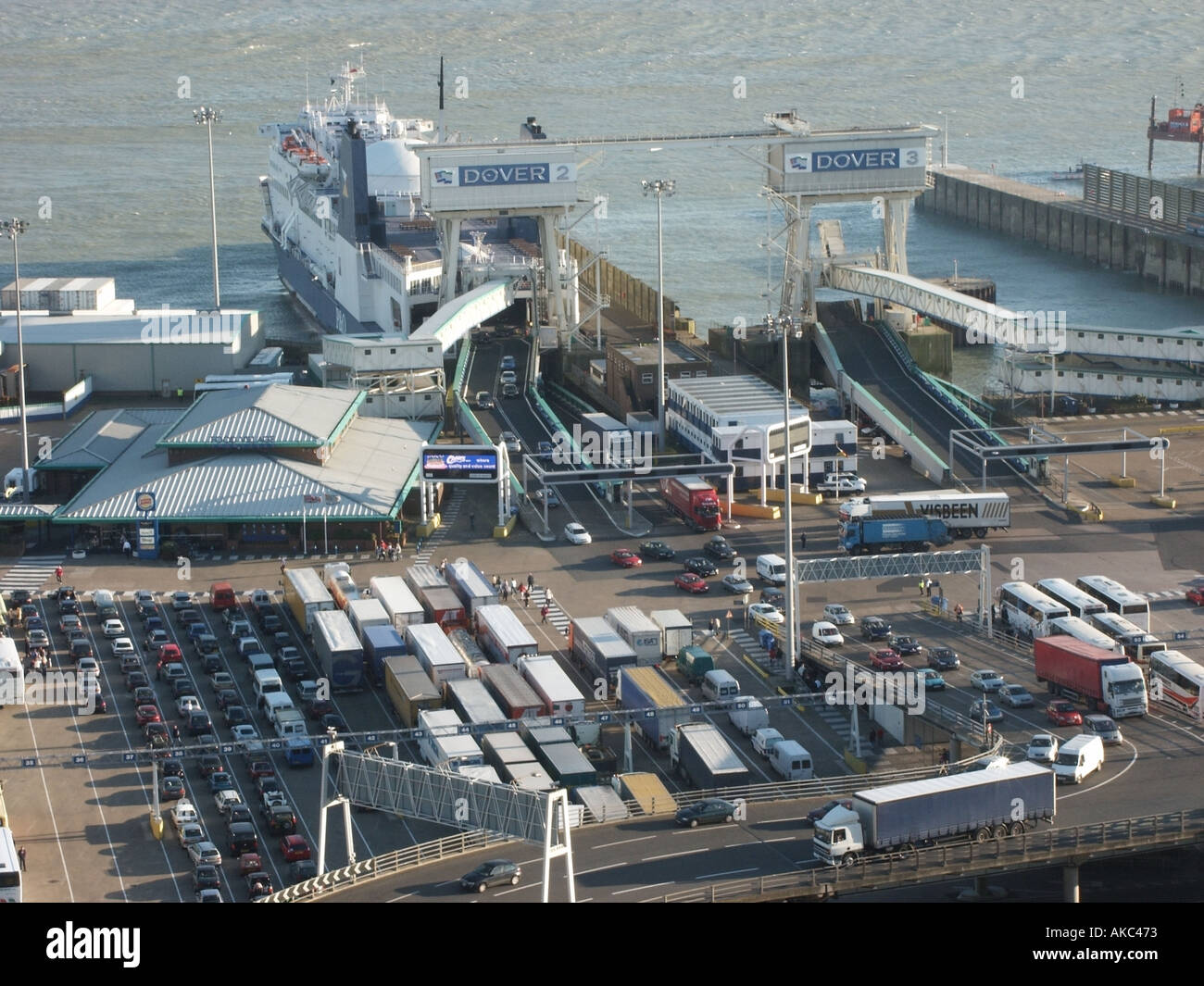 Aerial view cross channel ferry terminal & car lorry truck parking with