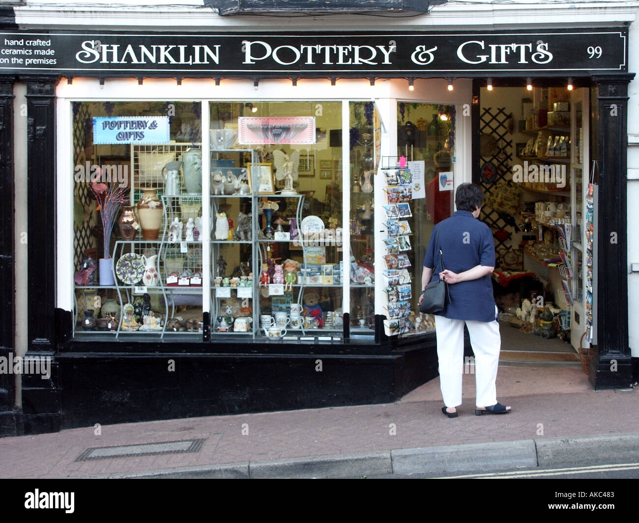 Shanklin Isle of Wight visitor looking at gift shop window display