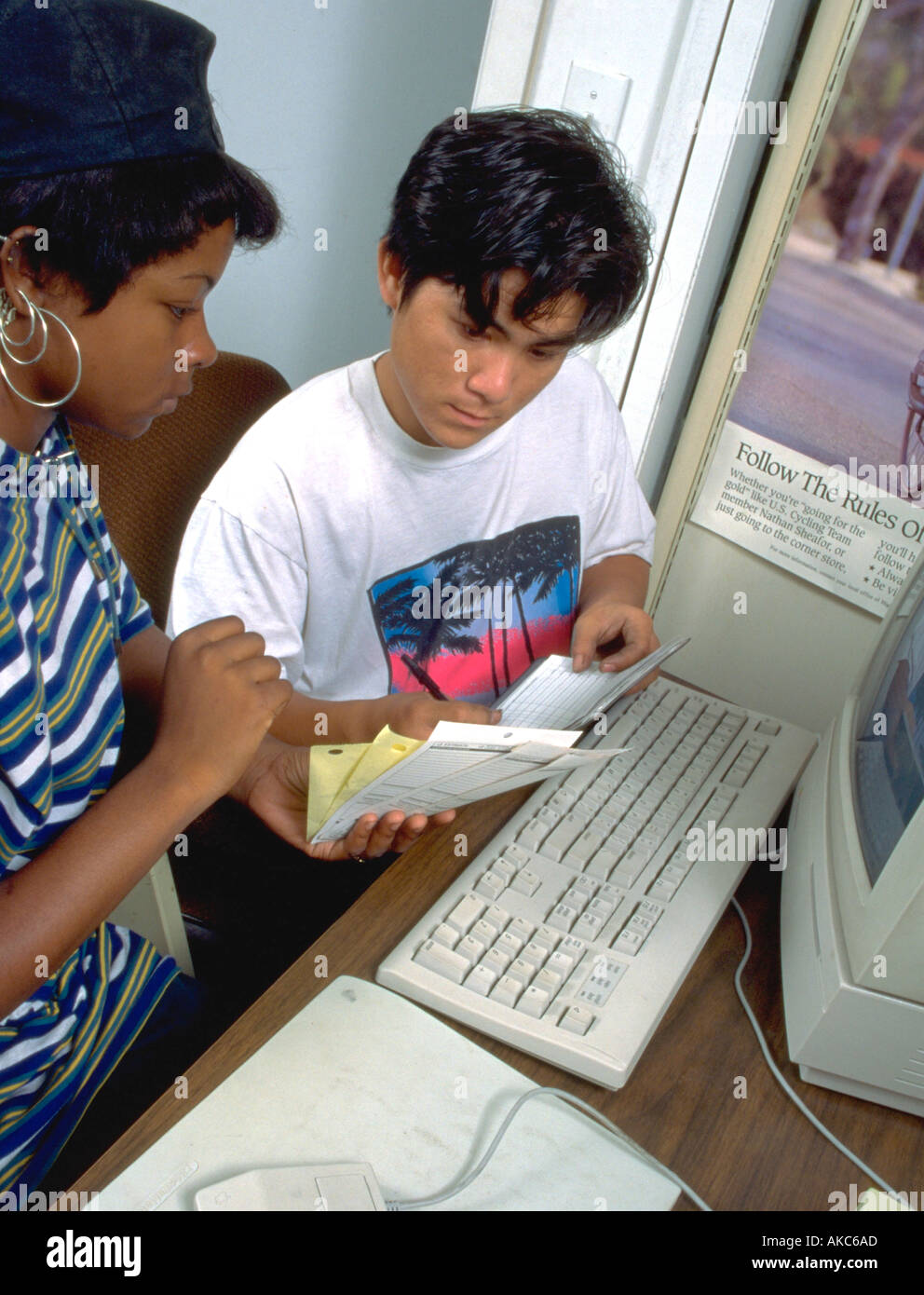 Employees age 16 paying bills at Youth Express Bike Shop. St Paul
