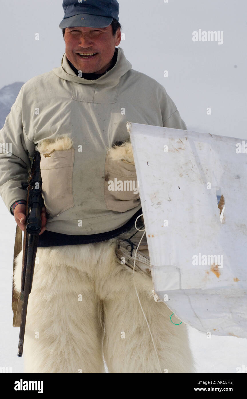 Traditional subsistence Inuit hunting Hunting for ringed seal Qaanaaq Greenland April 2006 Stock Photo