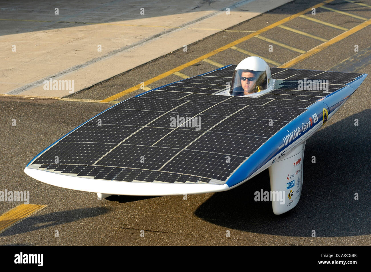 A solar racing car. This vehicle uses photovoltaik technology to convert sunshine into energy through its solar panels. Stock Photo
