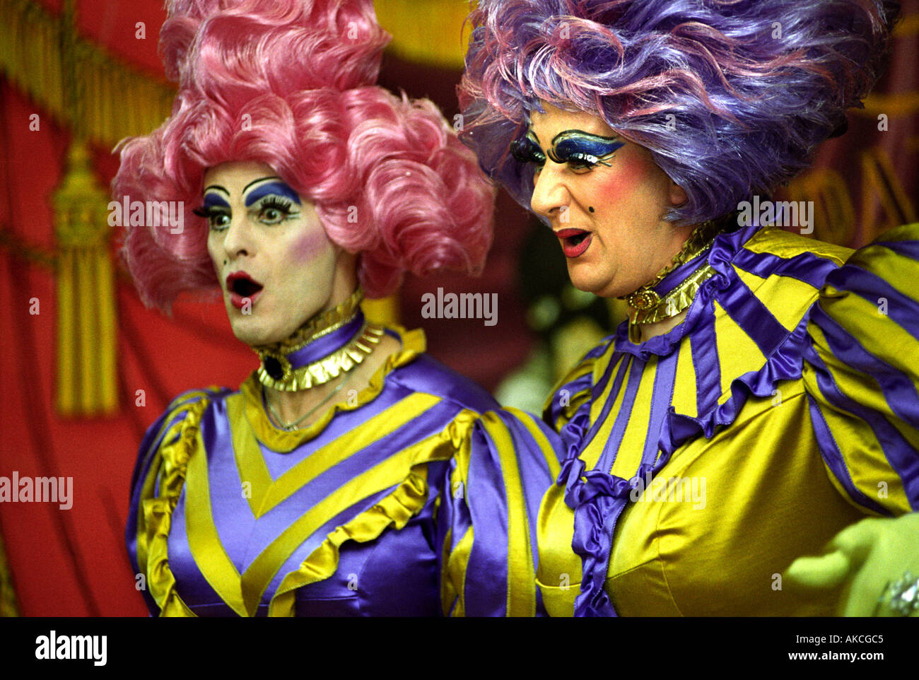 TWO PANTOMIME DAMES FROM THE CADBURYS PANTOMINE ROADSHOW AT MANOR PRIMARY SCHOOL WOLVERHAMPTON UK Stock Photo