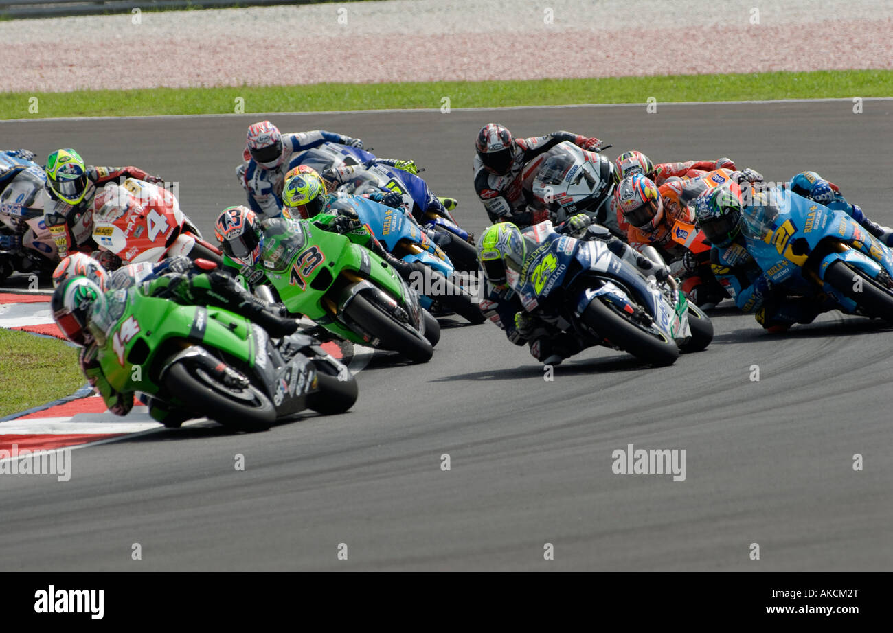 MotoGPriders at turn 2 during race day Stock Photo