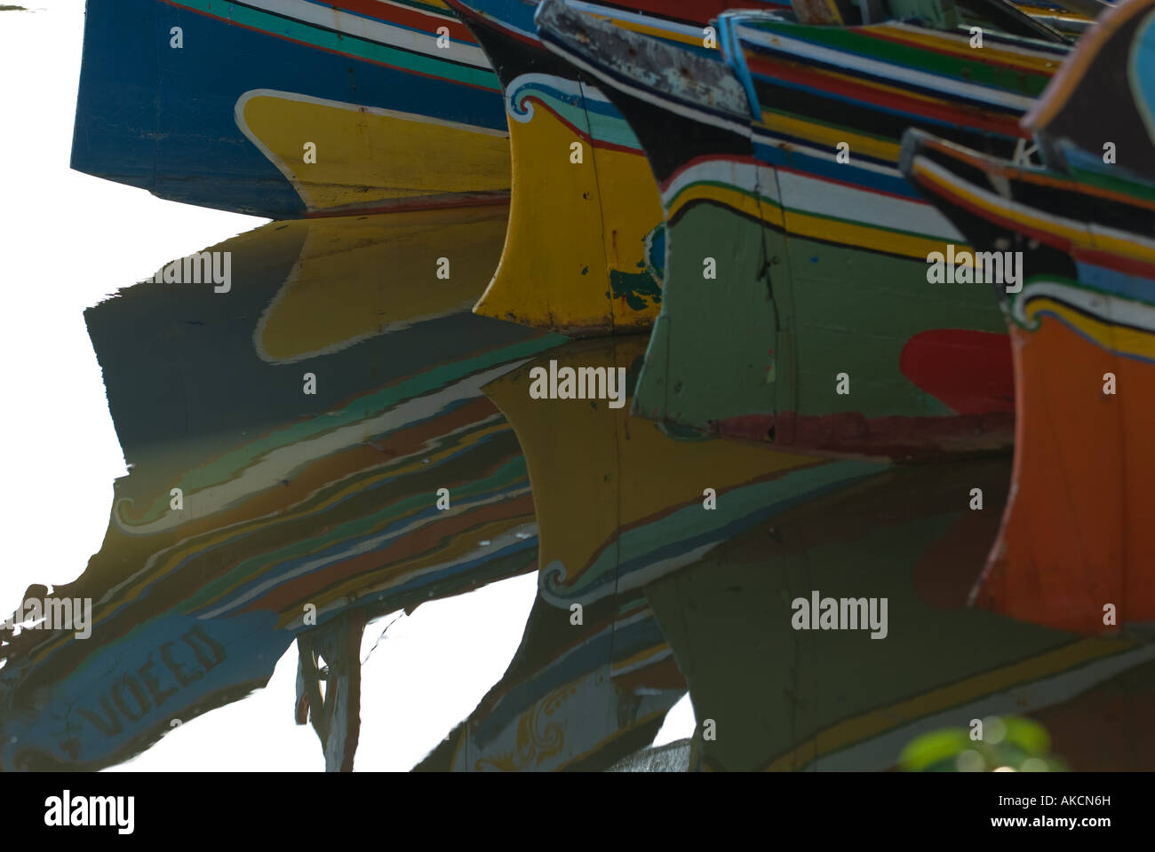 Colorful pattern and reflections of a traditional fishing boats in Kelantan, Malaysia. Stock Photo