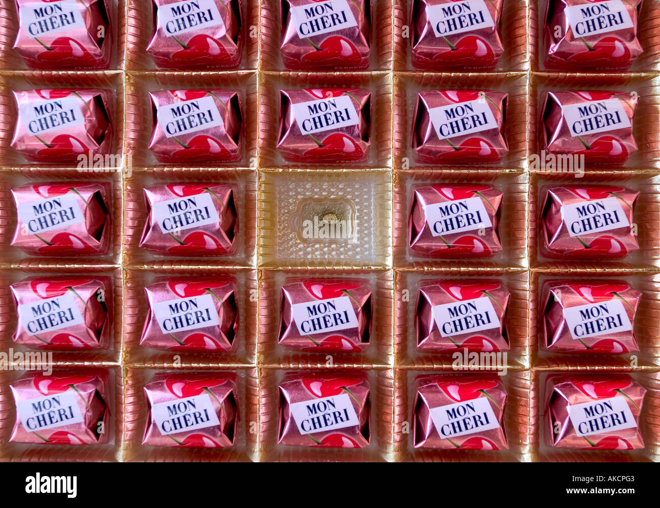 Mon Cheri chocolate box with one bonbons remained Stock Photo - Alamy