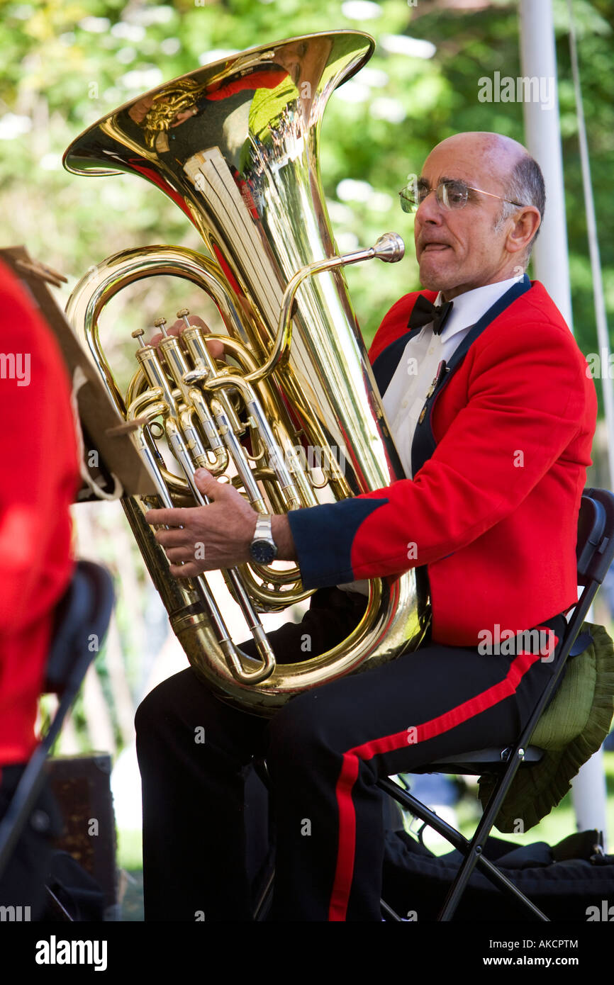 A tuba player in the band at the RHS Chelsea Flower Show. London