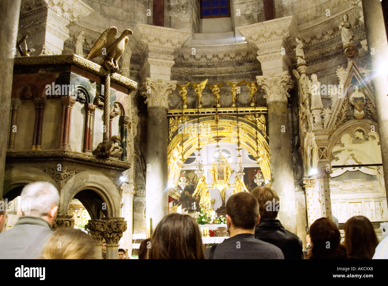 South-East Europe, Croatia, Dalmatia, Split, people praying in Saint Dominus cathedral, Stock Photo