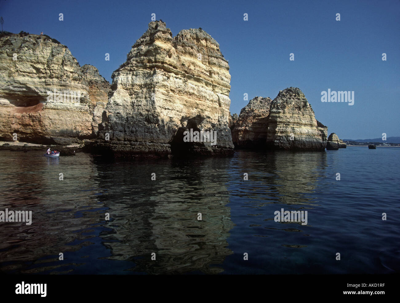 Beach and rocks in water near Lagos, Algarve, Portugal Stock Photo