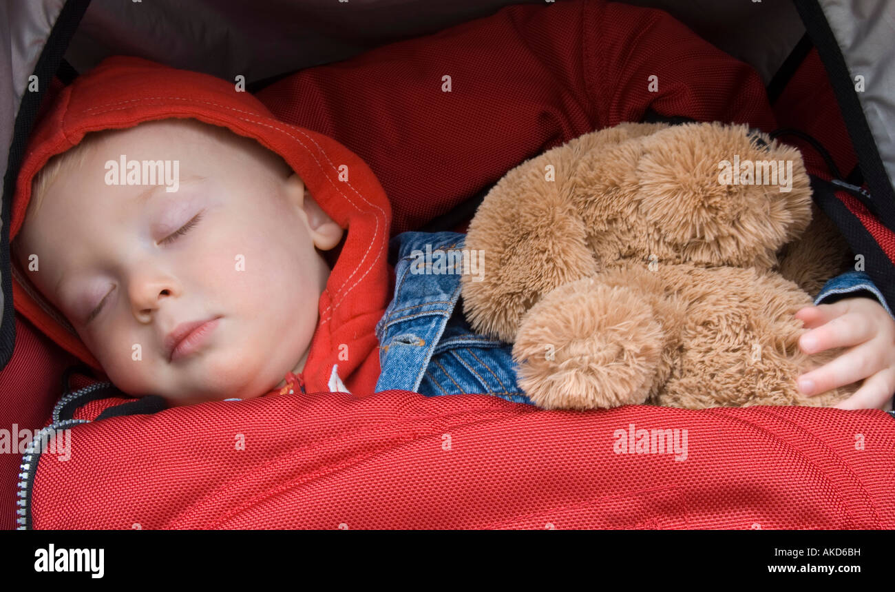 Baby Boy Asleep with Teddy Stock Photo