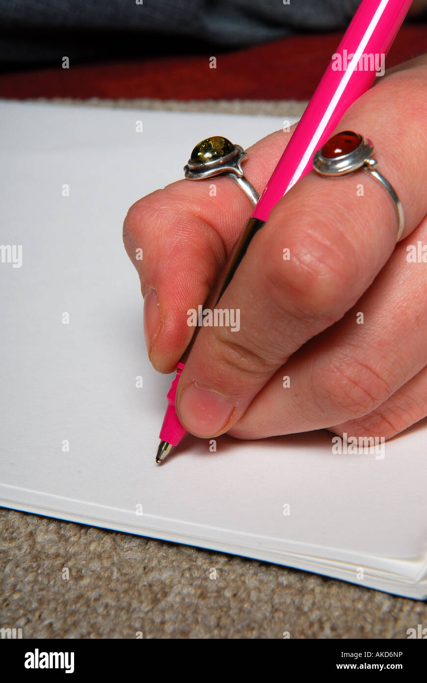 Hand writing with pen . Stock Photo