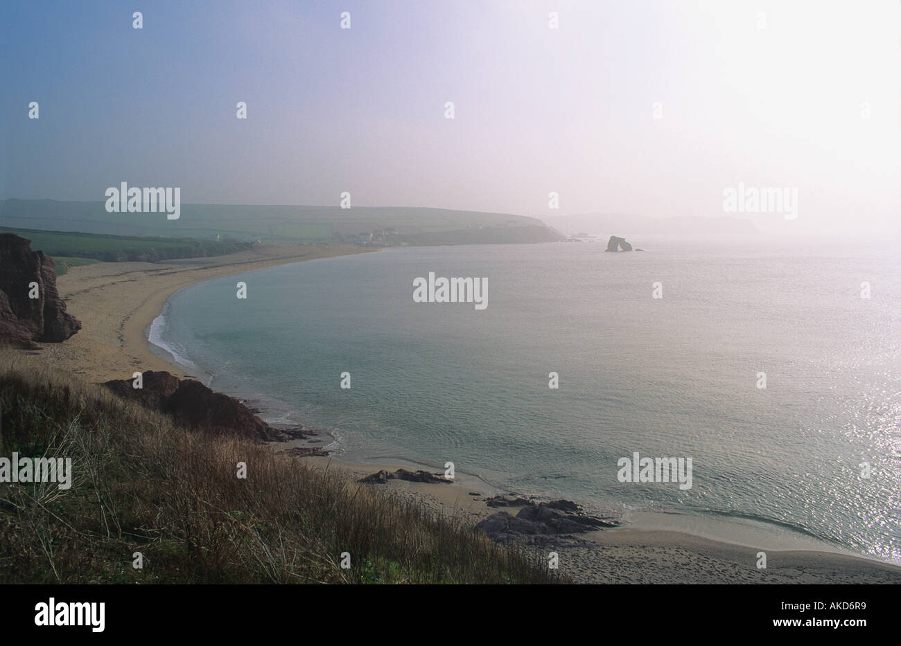 Misty morning from Warren Point towards Thurleston Rock and Bolt Tail in the distance South Devon Stock Photo