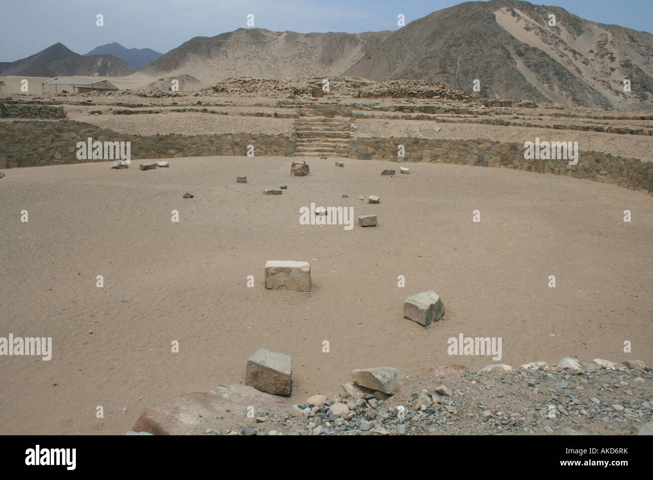 Circular plaza of the 5,000 year old ruins of Caral, 120 miles north of Peru's capital of Lima, in the Supe River Valley. Stock Photo