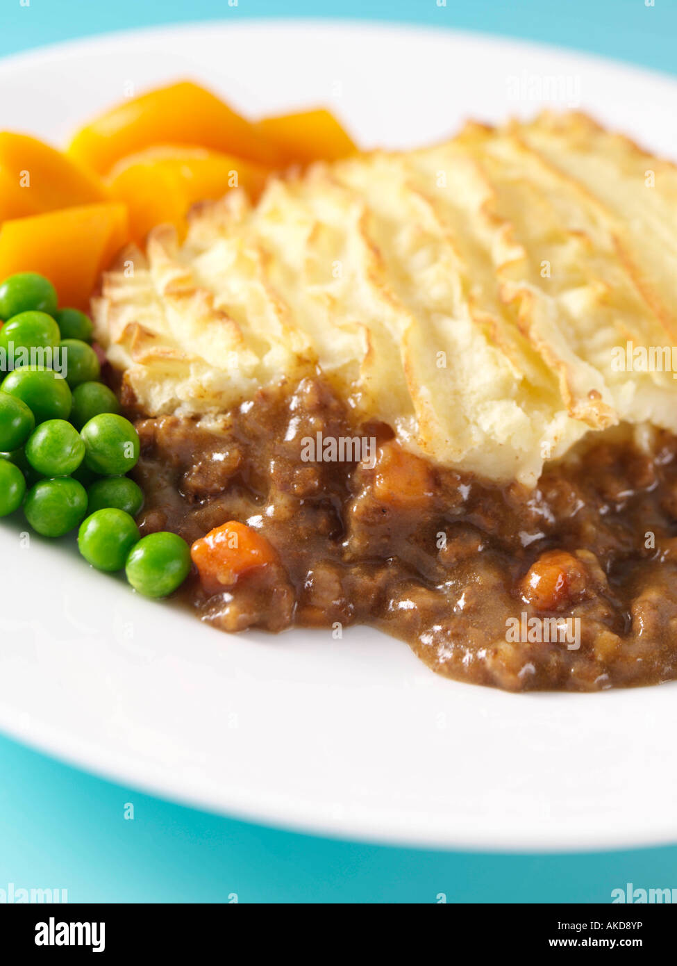 A Plate Of Home Made Traditional Shepherds Pie Peas And Carrots