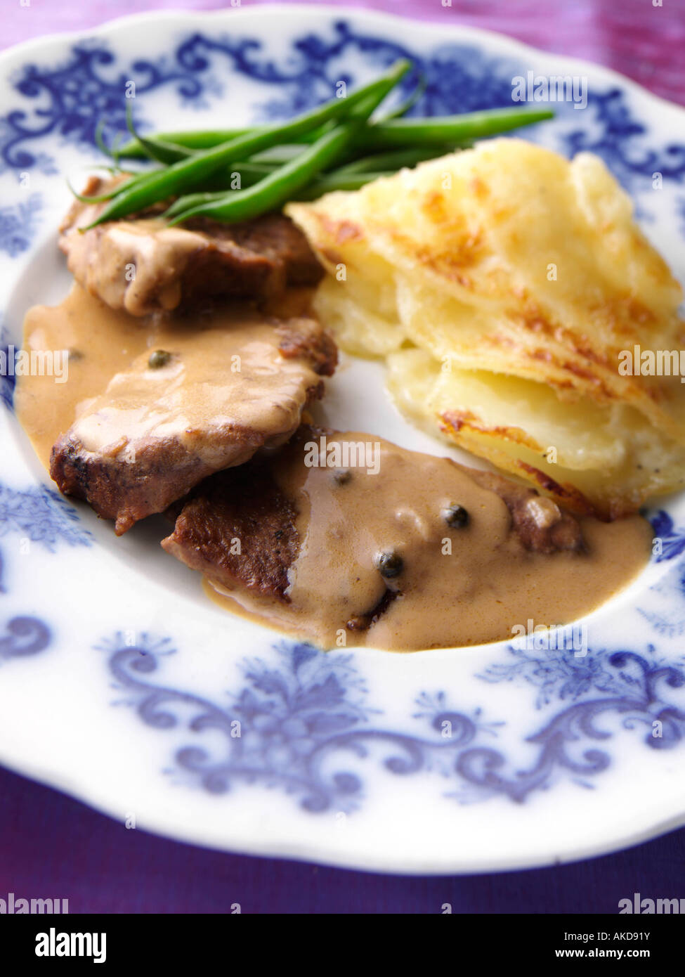 A Plate Of Steak Au Poivre Dauphinoise Potatoes Gourmet Editorial Stock Photo Alamy
