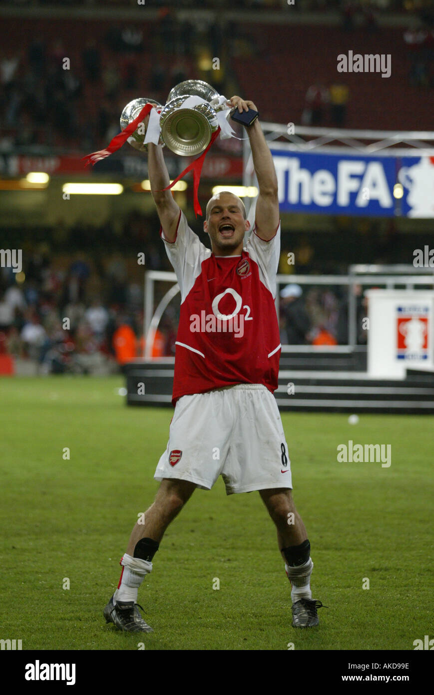 F A Cup winner Freddie Ljungberg Arsenal player holding the cup aloft Stock Photo