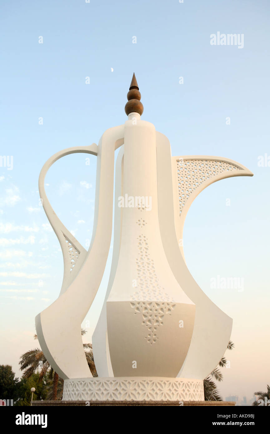 The Dallah coffee pot monument on the Corniche in Doha Qatar under a (tiny but real) half moon. Stock Photo