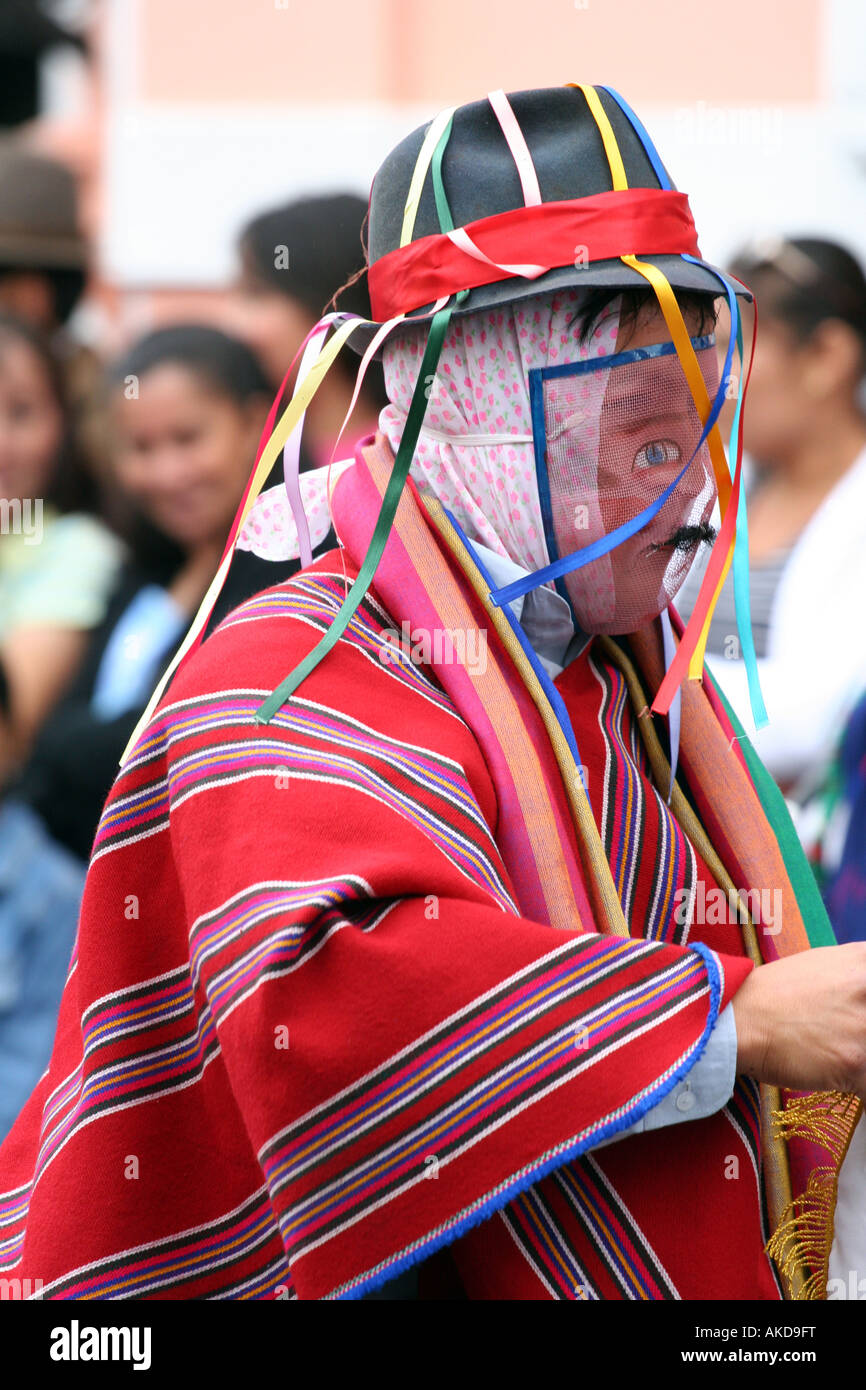 Costumed and masked local in a Street Parade during the Fiesta del Niño de Reyes in Riobamba, Ecuador on January 6th, 2007 Stock Photo