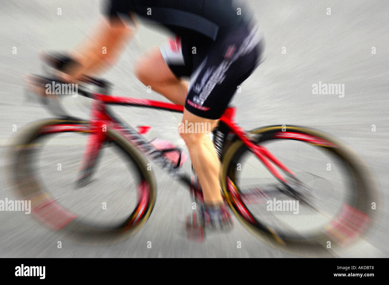Blurred cyclist competing in a road race Stock Photo