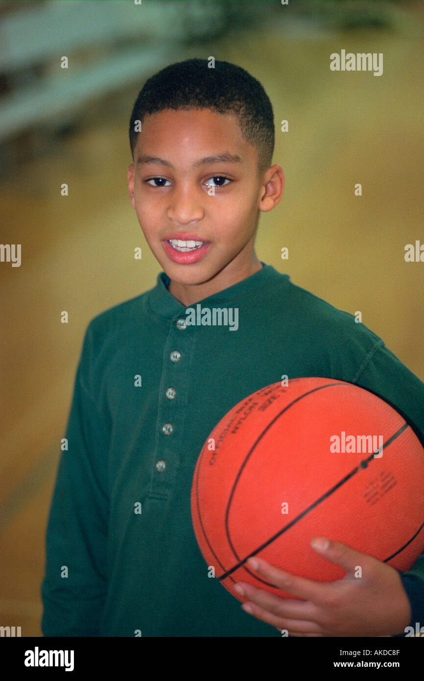 Teenage black boy smiling face hi-res stock photography and images - Alamy