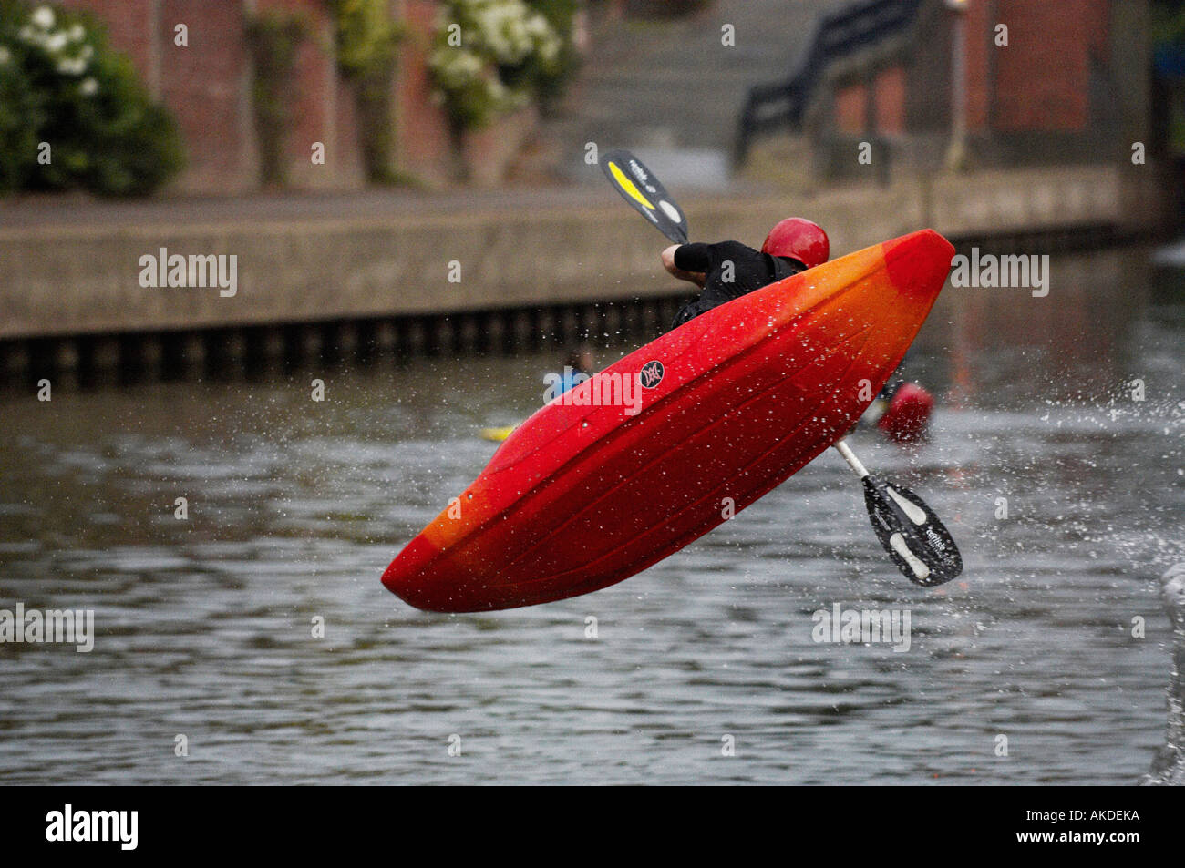 kayak flying off end of water ramp into river Stock Photo Alamy