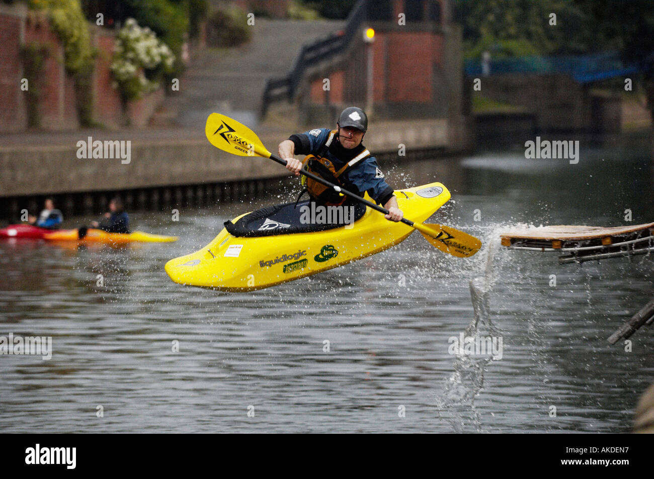 kayak flying off end of water ramp into river Stock Photo Alamy