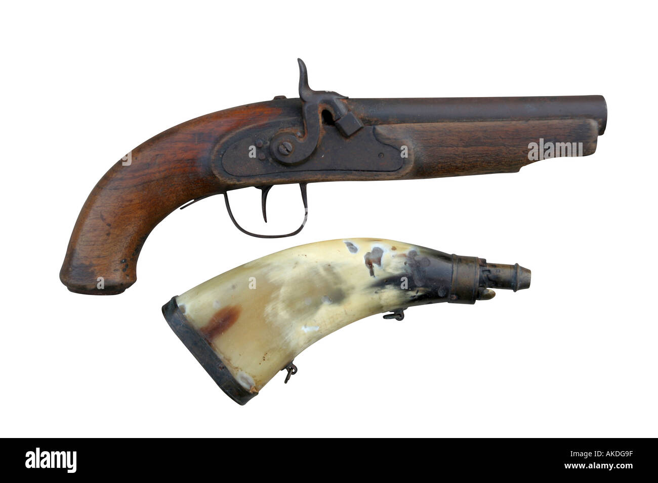 Antique pistol with powder horn Stock Photo