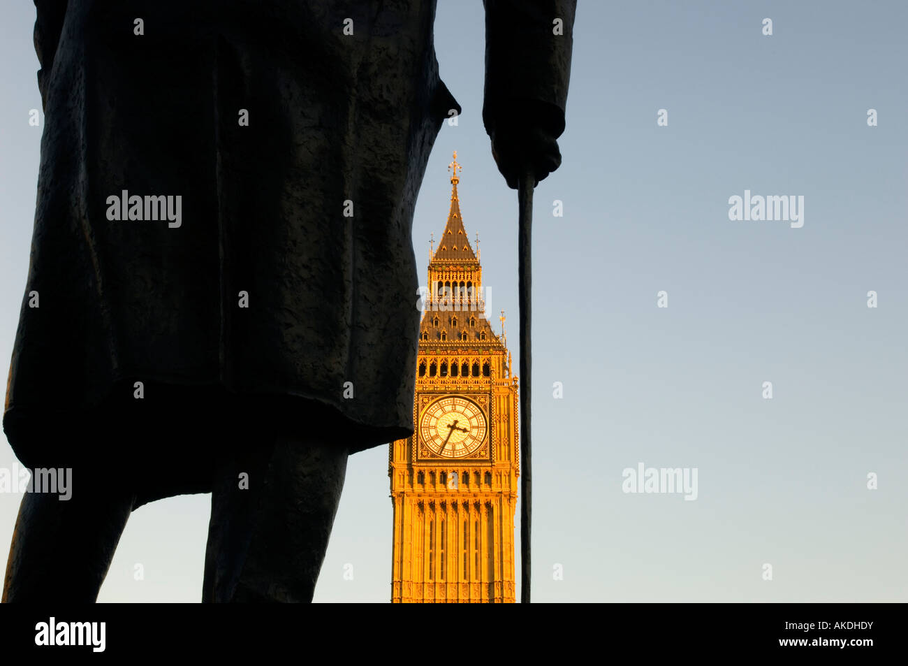 Statue of Sir Winston Churchill on Parliament Square and clock tower of Houses of Parliament Big Ben London United Kingdom Stock Photo