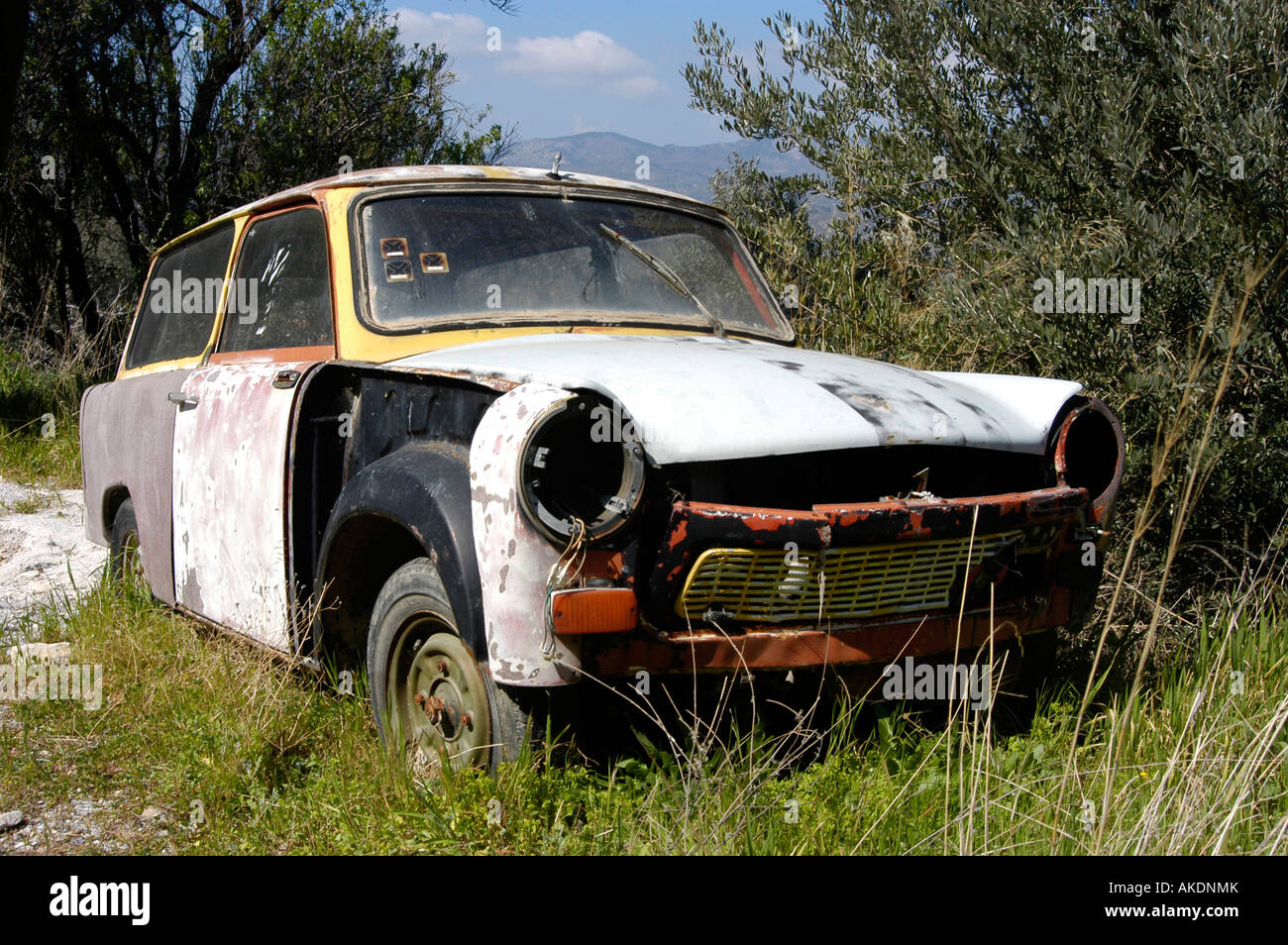 Abandoned carwreck of a Wartburg Trabant, greece. Stock Photo