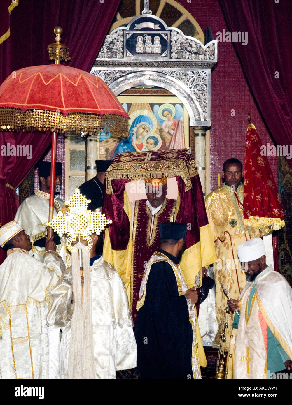 Ethiopian Clergy in the 'Holy of Holies' at Holy Trininty Cathedral during Timkat (Epiphany) celebrations and carrying a 'Tabot' Stock Photo