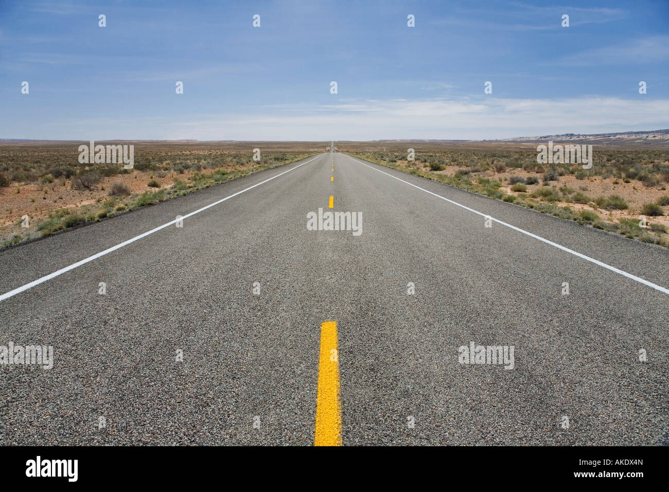 Road through desert Stock Photo