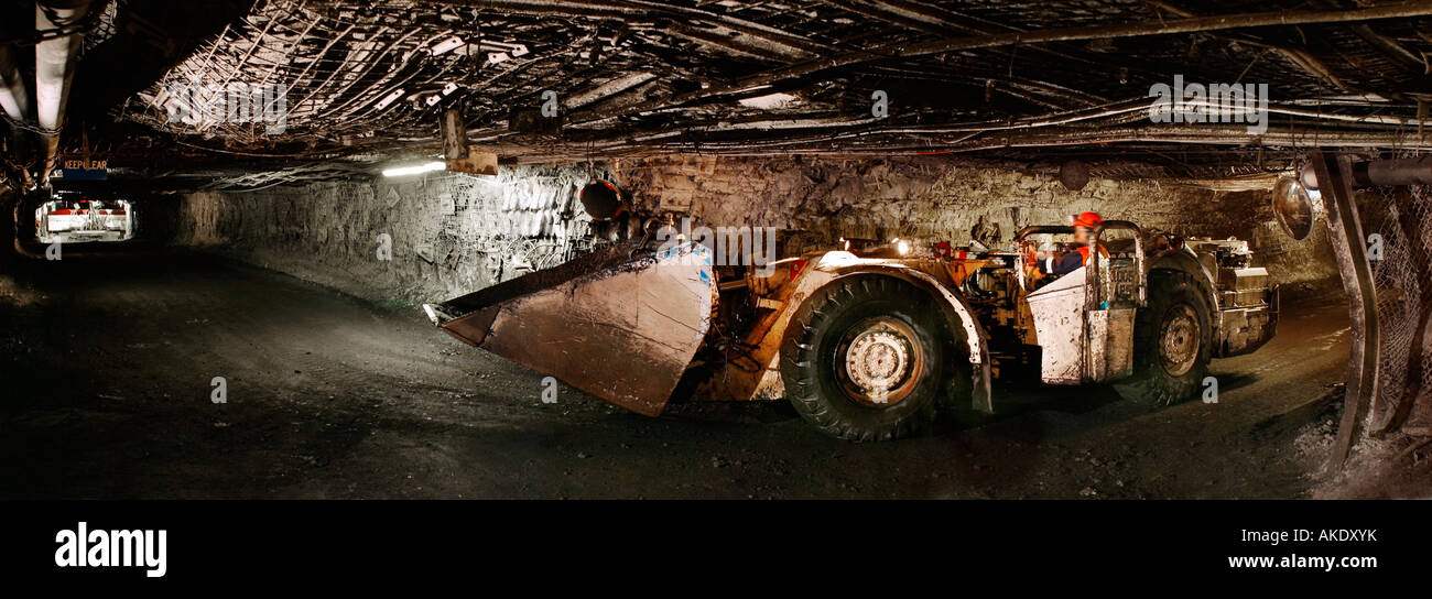 Person in unconventional car in tunnel, side view Stock Photo