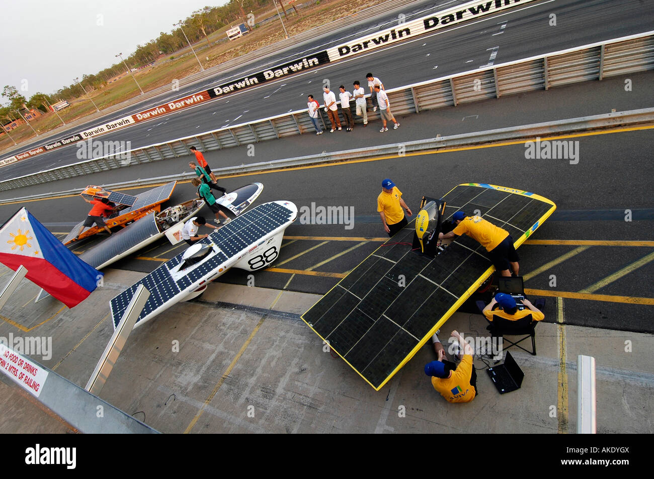 Solar racing cars on a racetrack. They use photovoltaik technology to convert sunshine into energy through their solar panels Stock Photo