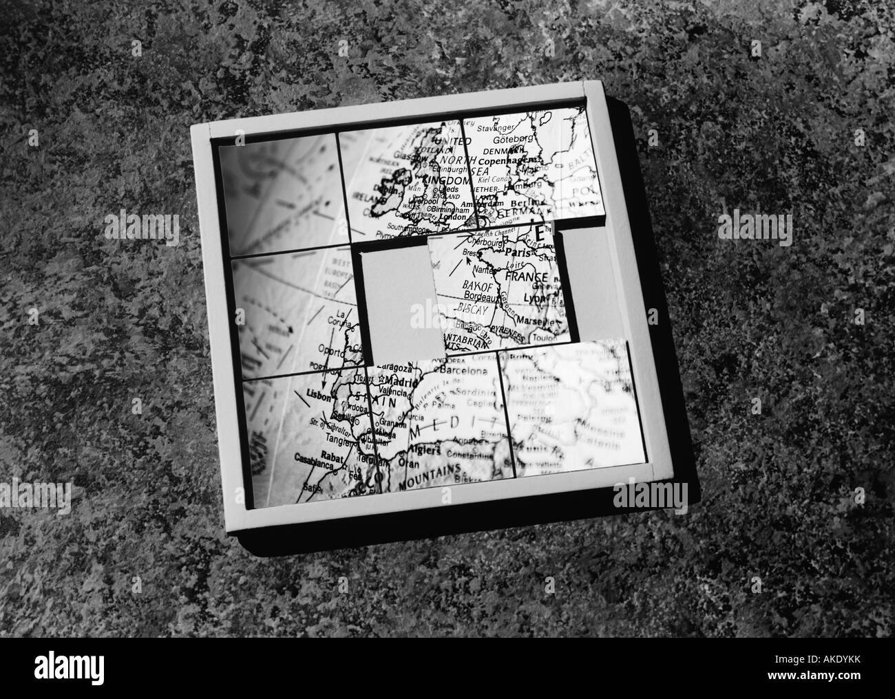 Slide-puzzle with jumbled map, (b&w) Stock Photo