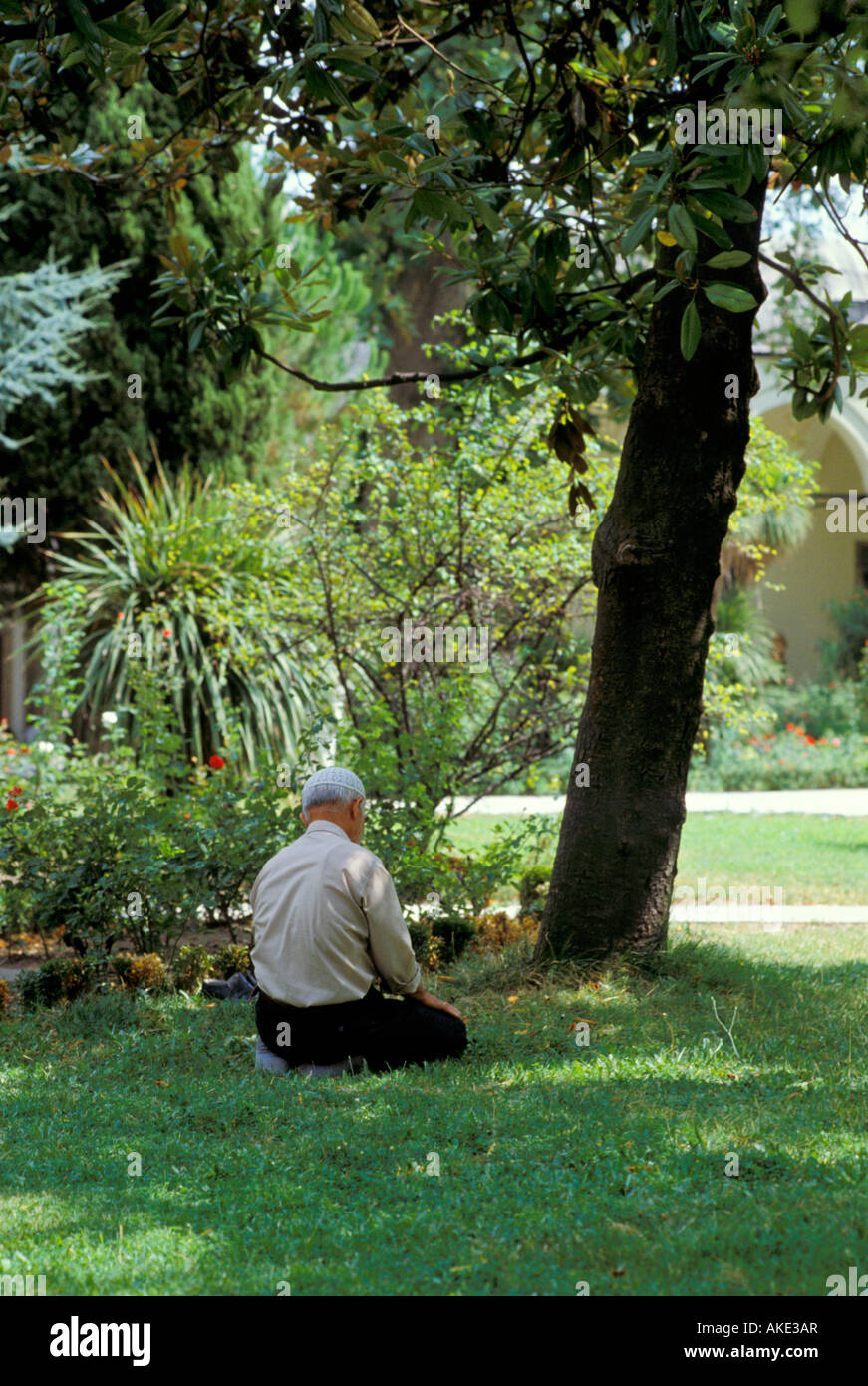praying man in the topkapi palace, istanbul, turkey Stock Photo - Alamy