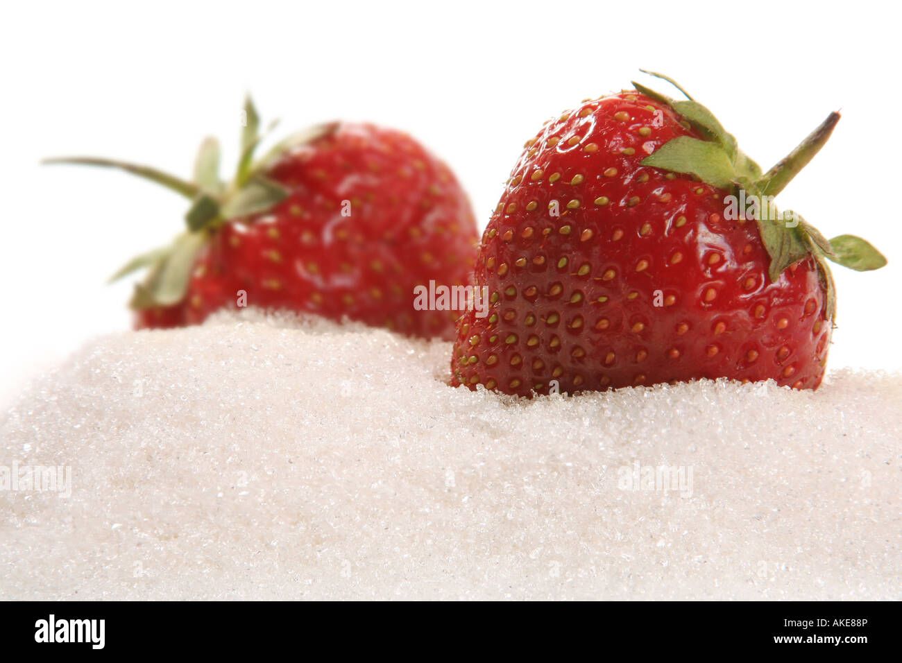 Strawberry isolated on white background in sugar Stock Photo