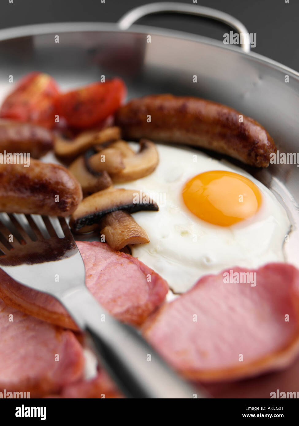 A full English cooked breakfast in a frying pan editorial food Stock Photo