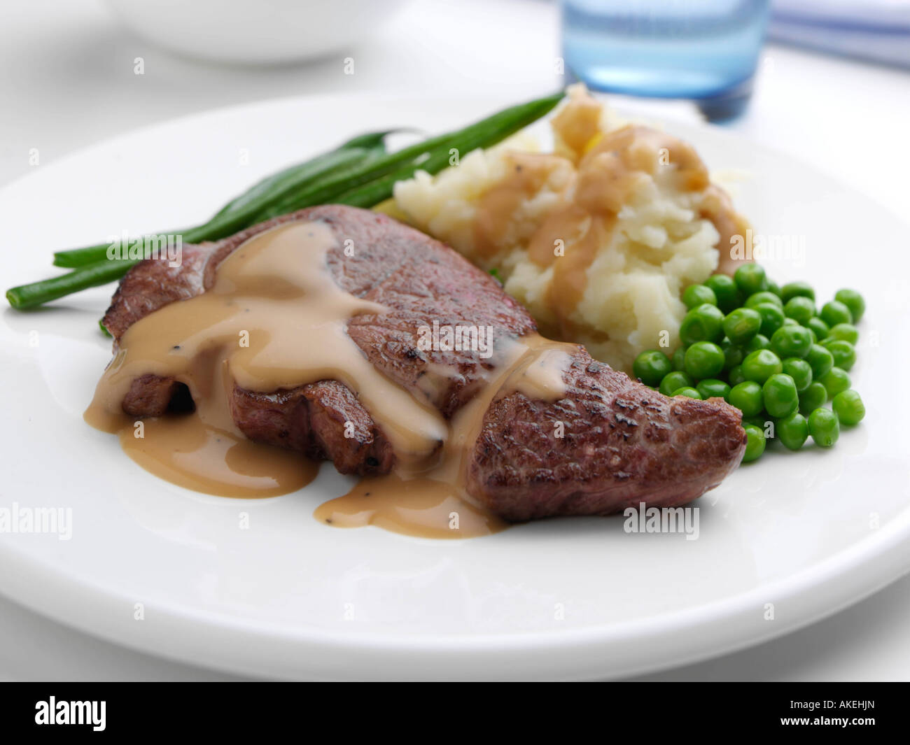 Lamb steak and mashed potatoes and peas editorial food Stock Photo