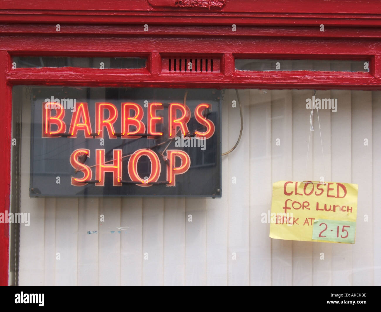 barber s shop neon sign with closed sign Stock Photo - Alamy