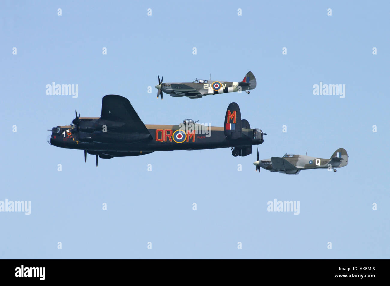 The RAF s Battle of Britain Memorial flights Avro Lancaster flying in formation with a Hurricane and Spitfire Stock Photo