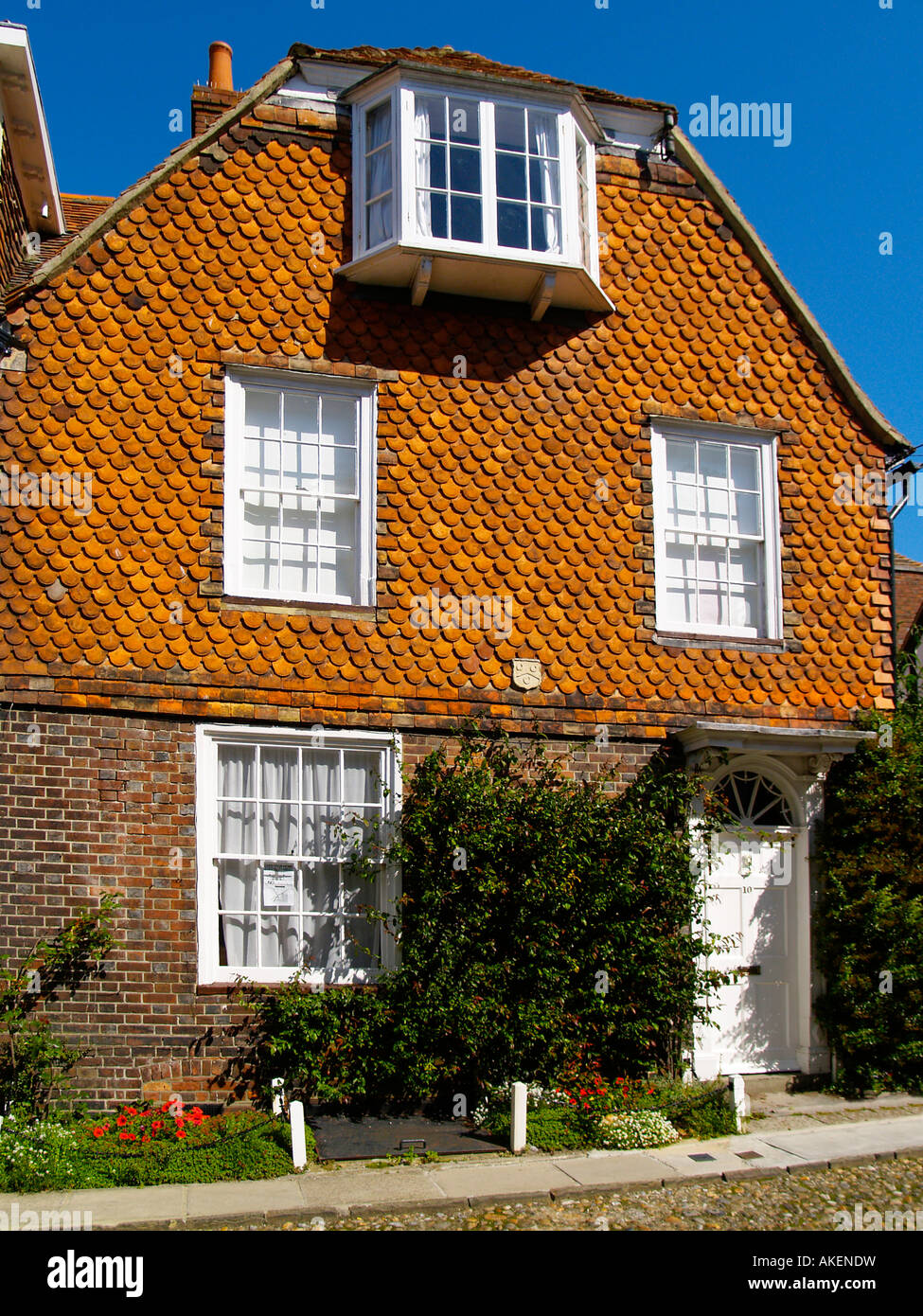 Partly tiled facade of a house in Watchbell Street, Rye, East Sussex Stock Photo