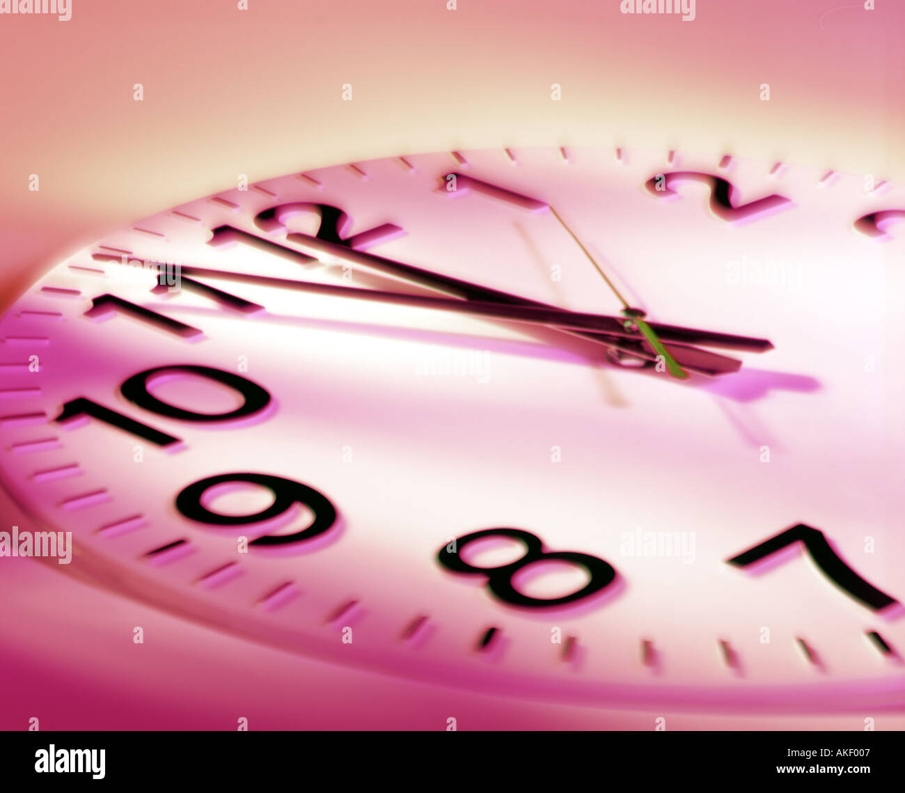 clock 5 to 12 symbol for deadline punctuality precision exactness time appointment Stock Photo