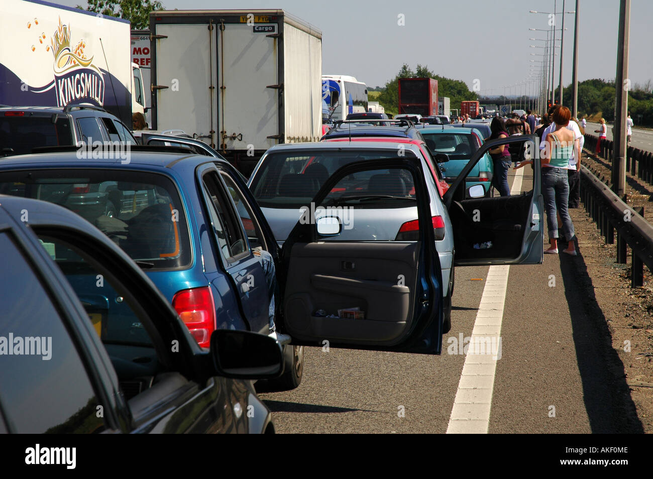 Traffic jam UK.Drivers get out of their cars when the M1 motorway at a