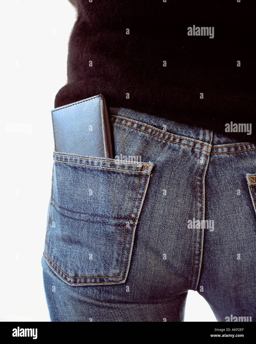 Wallet in back pocket of jeans Stock Photo Alamy